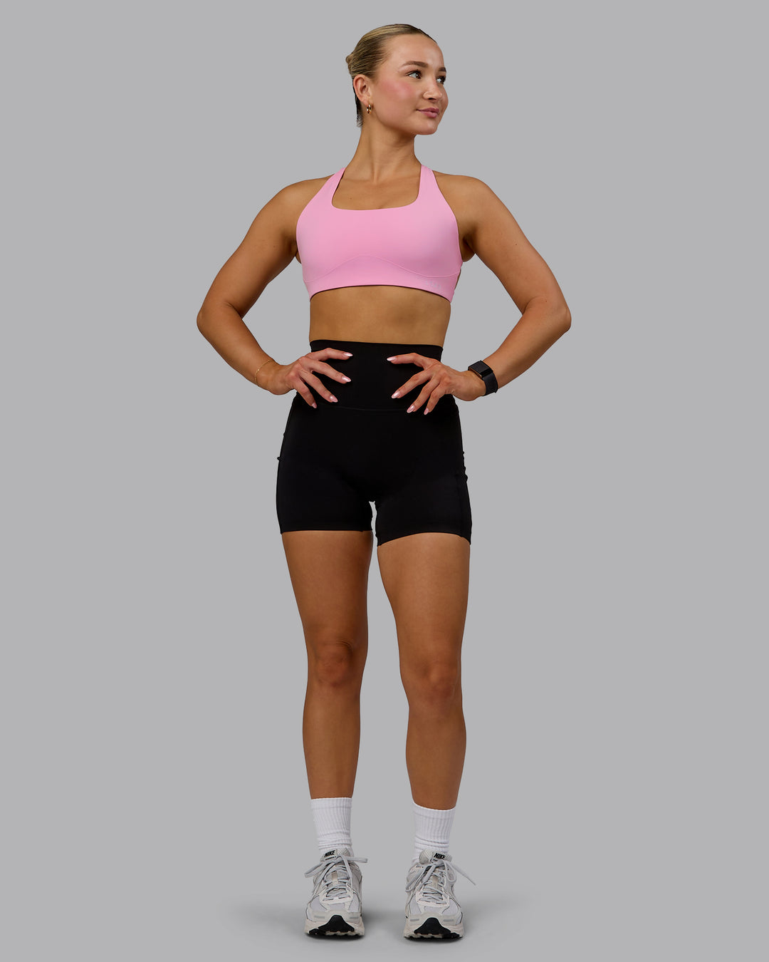 Woman wearing Aspire Sports Bra - Bubblegum - view 5