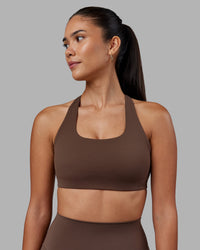 Woman wearing Aspire Sports Bra - Chocolate Martini | Model:Rhiley | Size:S | Thumbnail Index: 1