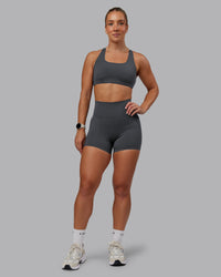 Woman wearing Aspire Sports Bra in Dark Storm | Size:S | Thumbnail Index: 2