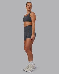 Woman wearing Aspire Sports Bra in Dark Storm | Size:S | Thumbnail Index: 5