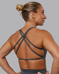 Woman wearing Aspire Sports Bra in Dark Storm | Size:S | Thumbnail Index: 3