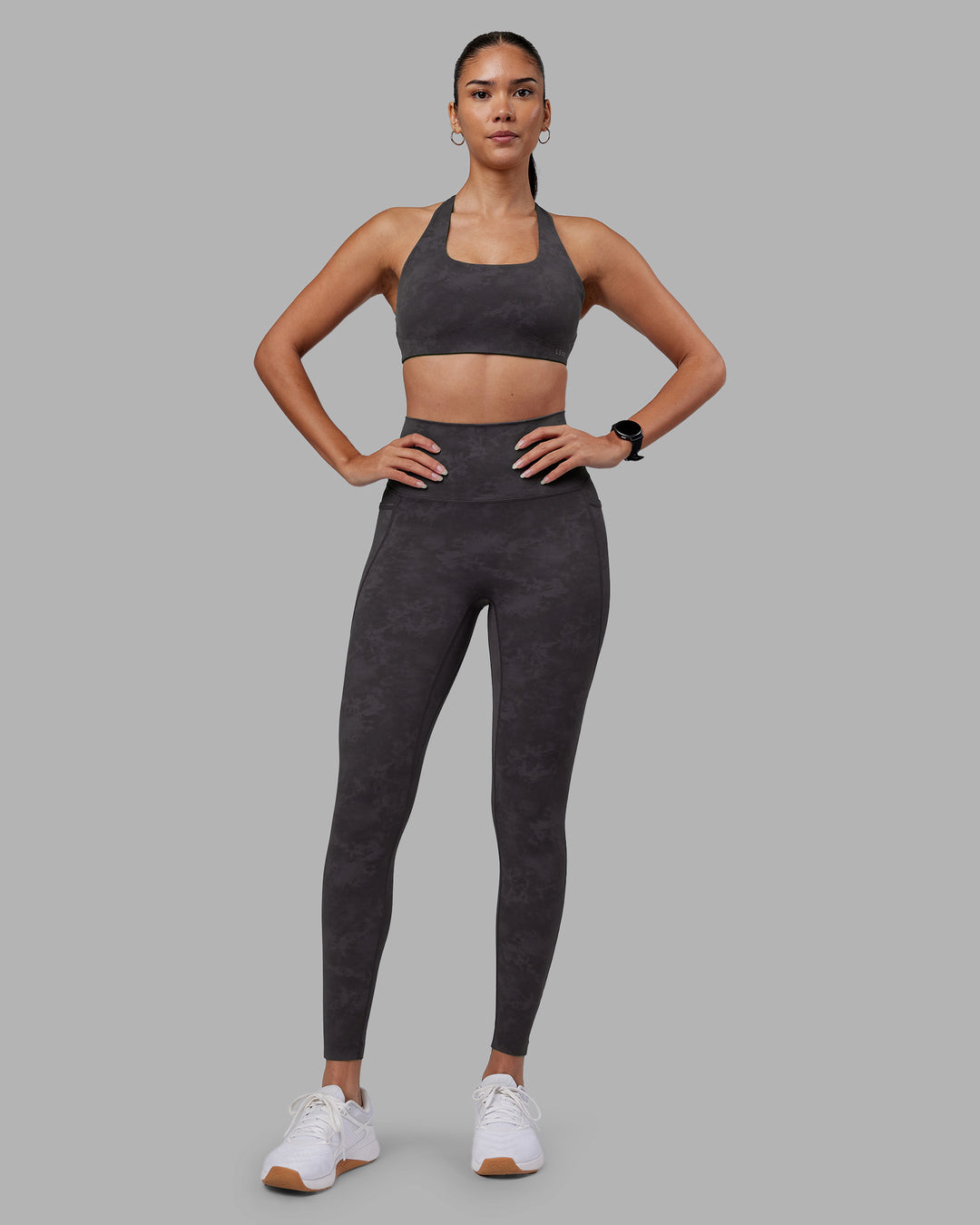 Woman wearing Aspire Sports Bra - Dark Storm Wash | Model:Rhiley | Size:S - view 6