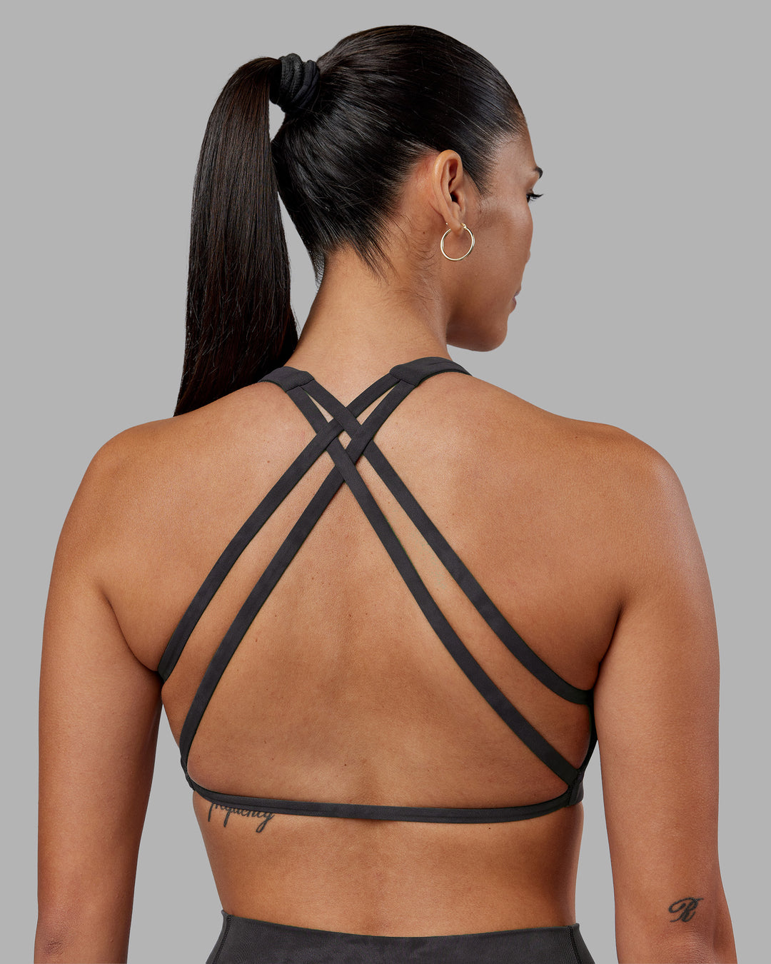 Woman wearing Aspire Sports Bra - Dark Storm Wash | Model:Rhiley | Size:S - view 7
