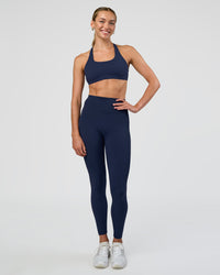Woman wearing Aspire Sports Bra - Future Navy | Model:Evie | Size:S | Thumbnail Index: 2