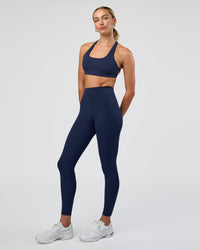 Woman wearing Aspire Sports Bra - Future Navy | Model:Evie | Size:S | Thumbnail Index: 5