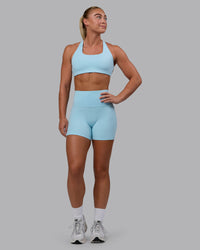 Woman wearing Aspire Sports Bra - Glacial Blue | Thumbnail Index: 6