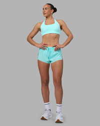Woman wearing Aspire Sports Bra - Island Paradise | Model:Sophie | Size:S | Thumbnail Index: 5