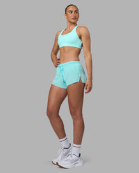 Woman wearing Aspire Sports Bra - Island Paradise | Model:Sophie | Size:S | Thumbnail Index: 6