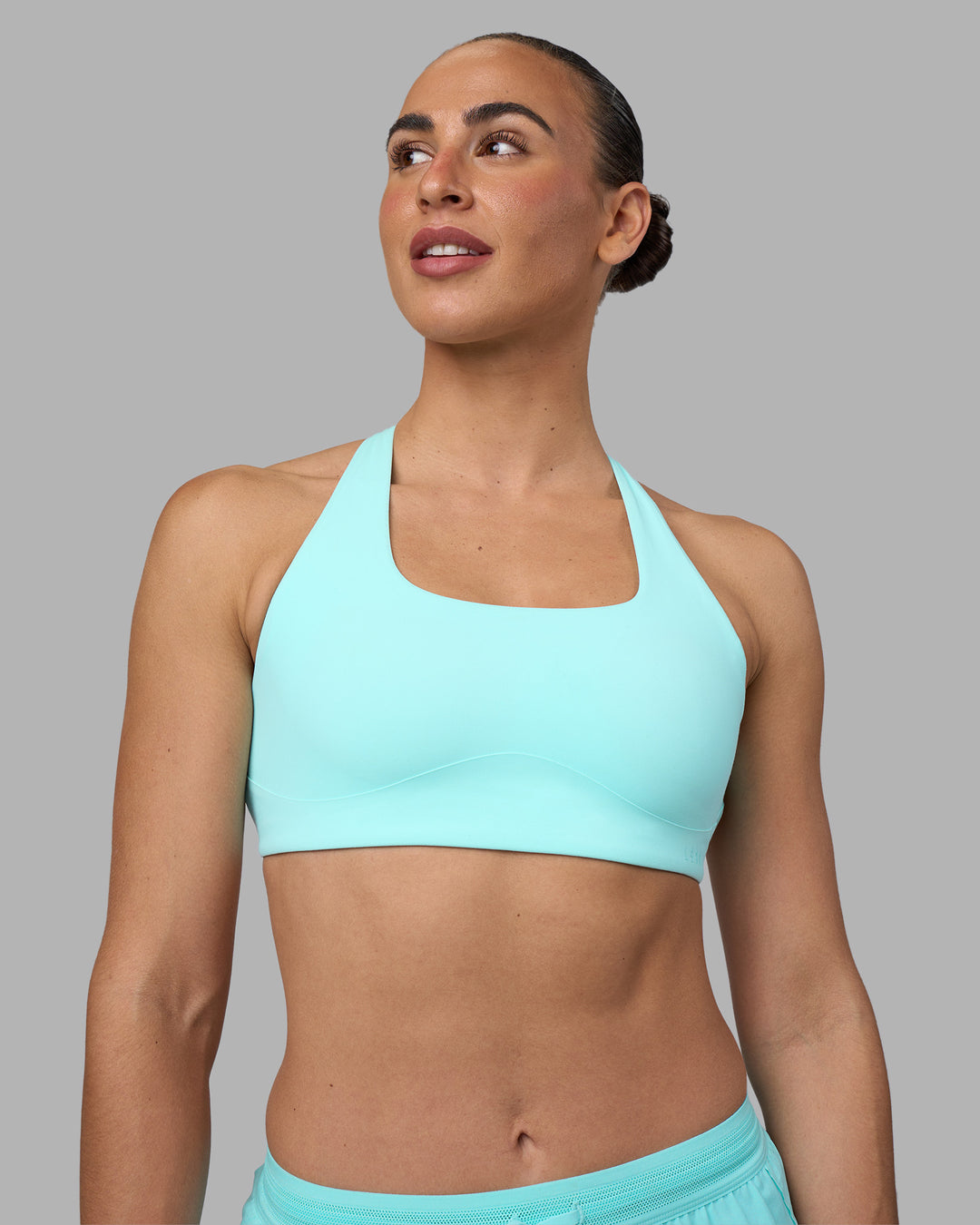 Woman wearing Aspire Sports Bra - Island Paradise | Model:Sophie | Size:S - view 3
