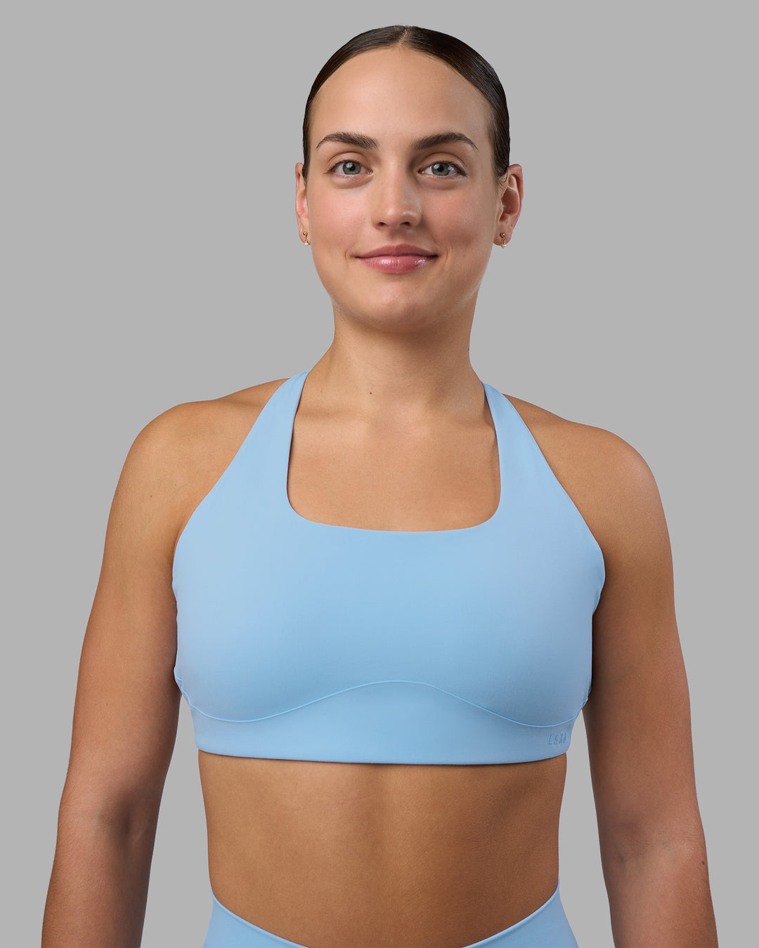 Woman wearing Aspire Sports Bra - Open Air | Model:Keisha | Size:S - view 1