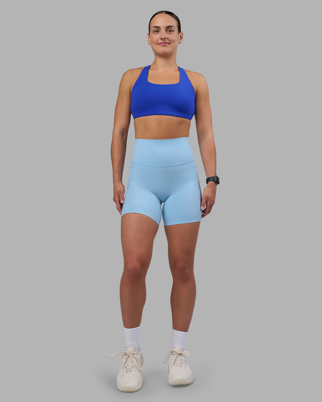 Woman wearing Aspire Sports Bra - Power Cobalt | Model:Keisha | Size:S - view 5