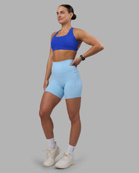 Woman wearing Aspire Sports Bra - Power Cobalt | Model:Keisha | Size:S | Thumbnail Index: 3