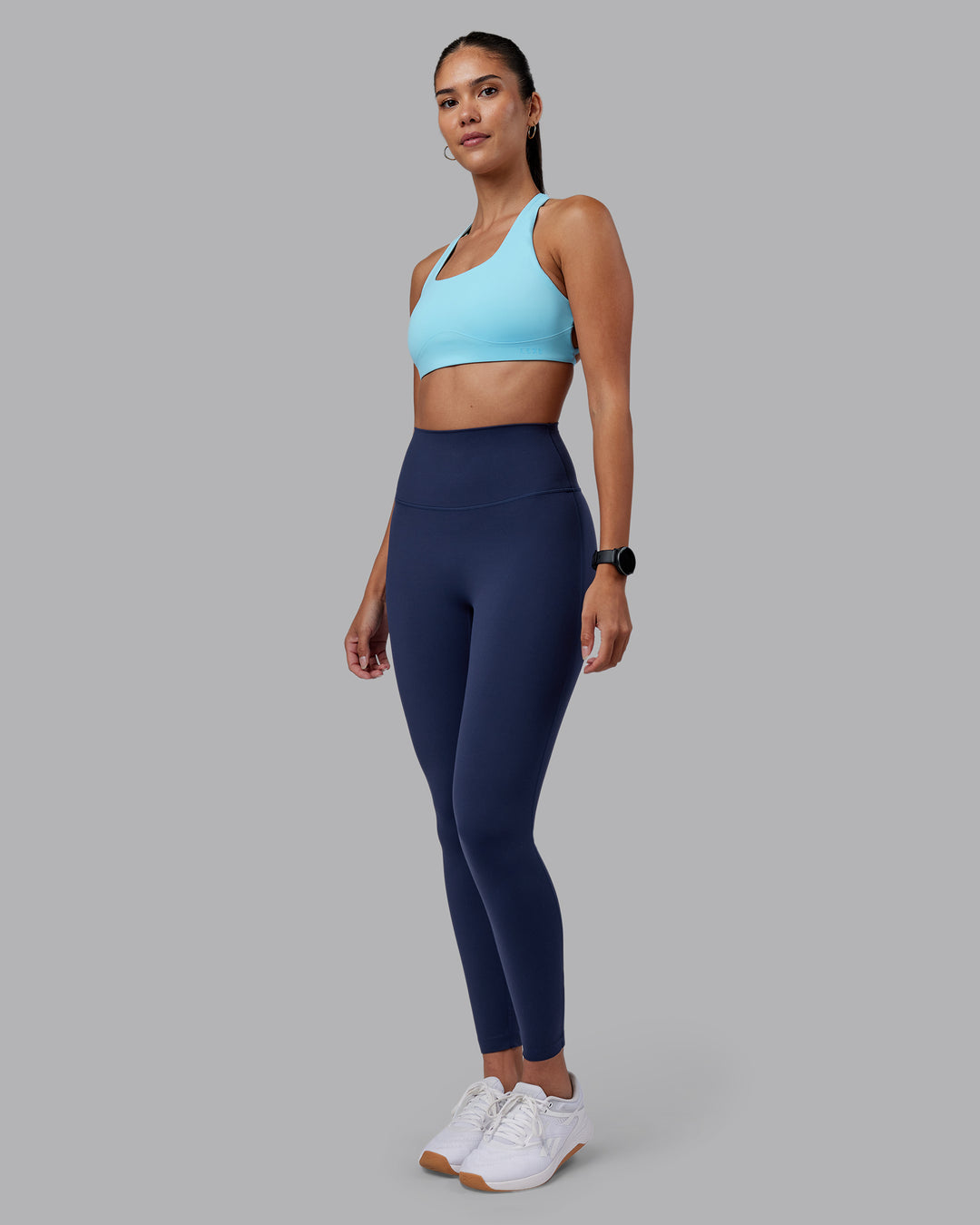 Woman wearing Aspire Sports Bra - Sky Blue | Model:Rhiley | Size:S - view 4