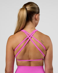 Woman wearing Aspire Sports Bra - Ultra Fuchsia | Model:Myrte | SIze:S | Thumbnail Index: 0