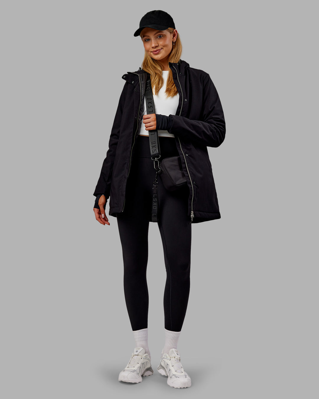 Woman wearing Auxiliary 2.0 Jacket - Black | Model:Ella | Size:S - view 7