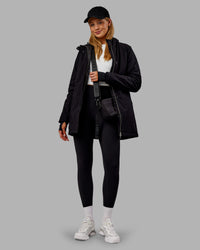 Woman wearing Auxiliary 2.0 Jacket - Black | Model:Ella | Size:S | Thumbnail Index: 6