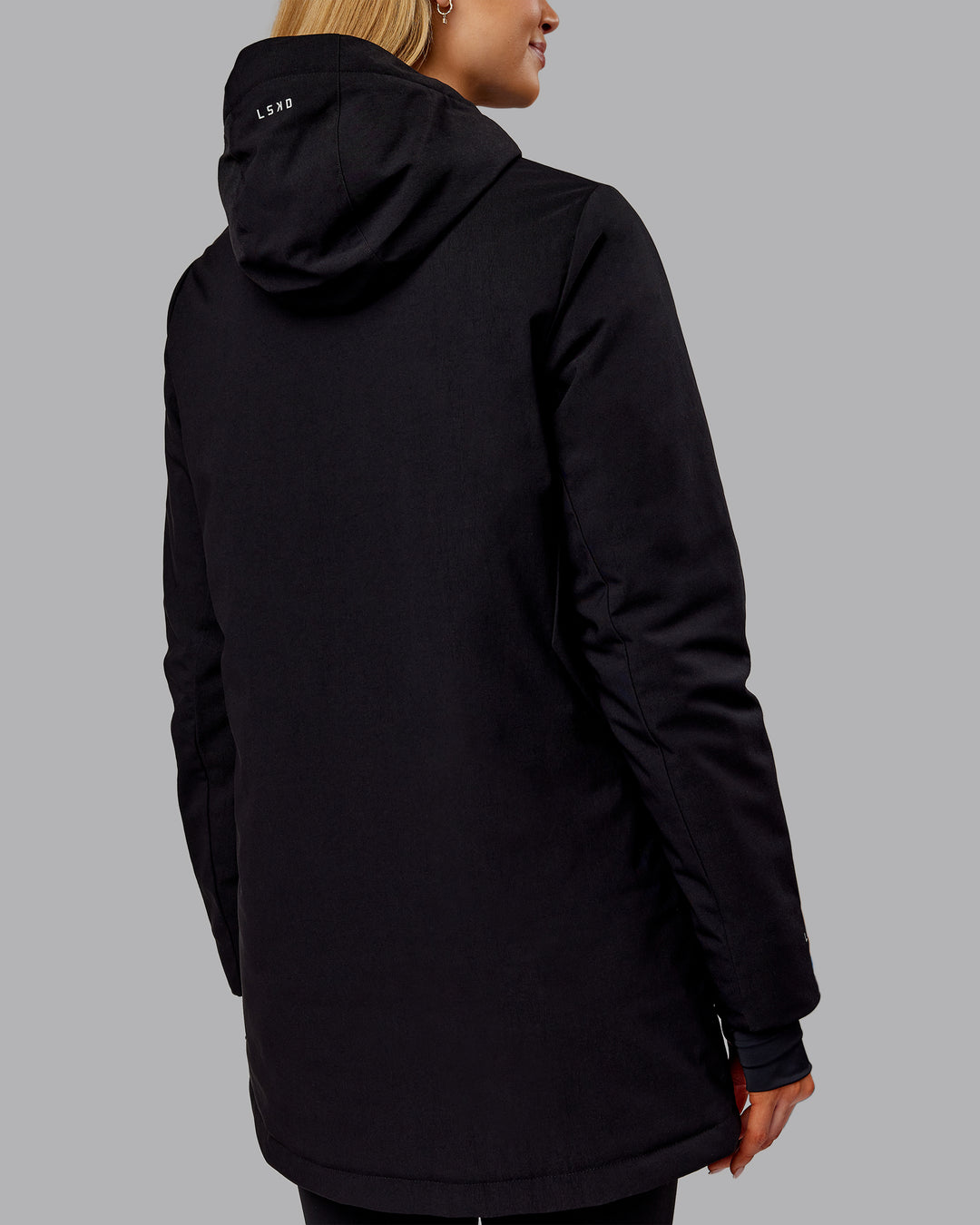 Woman wearing Auxiliary 2.0 Jacket - Black | Model:Ella | Size:S - view 3