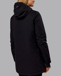 Woman wearing Auxiliary 2.0 Jacket - Black | Model:Ella | Size:S | Thumbnail Index: 2