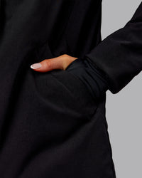 Woman wearing Auxiliary 2.0 Jacket - Black | Model:Ella | Size:S | Thumbnail Index: 9