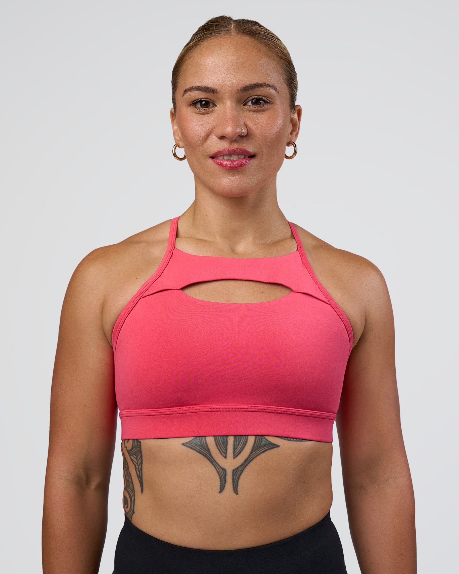 Woman wearing Be Bold Sports Bra - Bright Raspberry | Model:Tenaya | Size:S