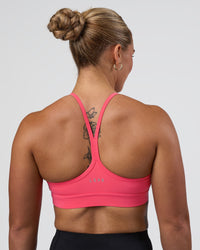 Woman wearing Be Bold Sports Bra - Bright Raspberry | Model:Tenaya | Size:S | Thumbnail Index: 1