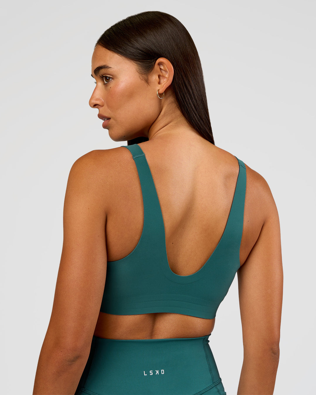 Woman wearing Bend &amp; FLX Plunge Sports Bra - Transformative Teal | Model:Ruby | Size:S - view 7