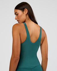Woman wearing Bend & FLX Plunge Tank - Transformative Teal | Model:Ruby | Size:S | Thumbnail Index: 10