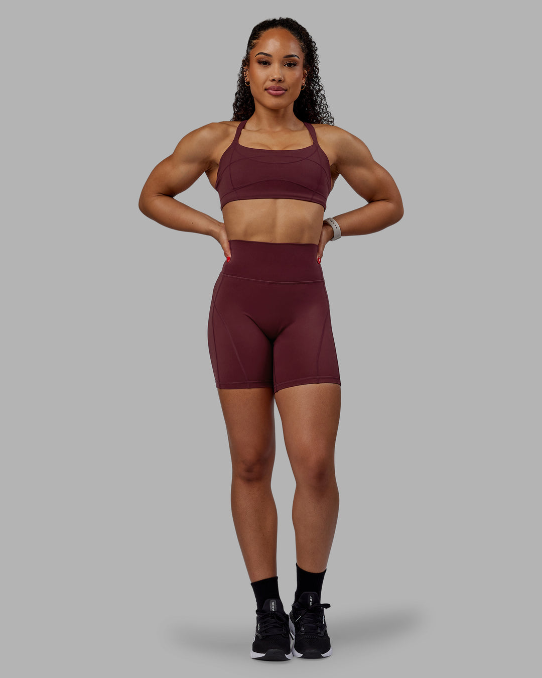 Woman wearing Bend Ultra High-Rise 6" Short - Dark Cherry - view 7