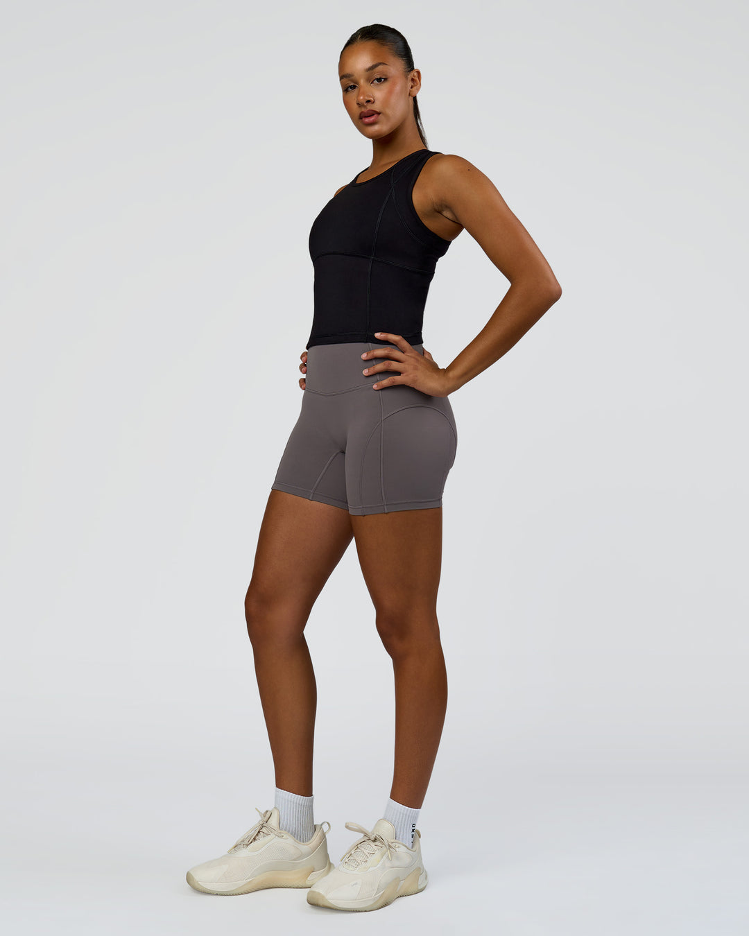 Woman wearing Bend Performance Tank - Black | Model:Rosie | Size:S - view 5