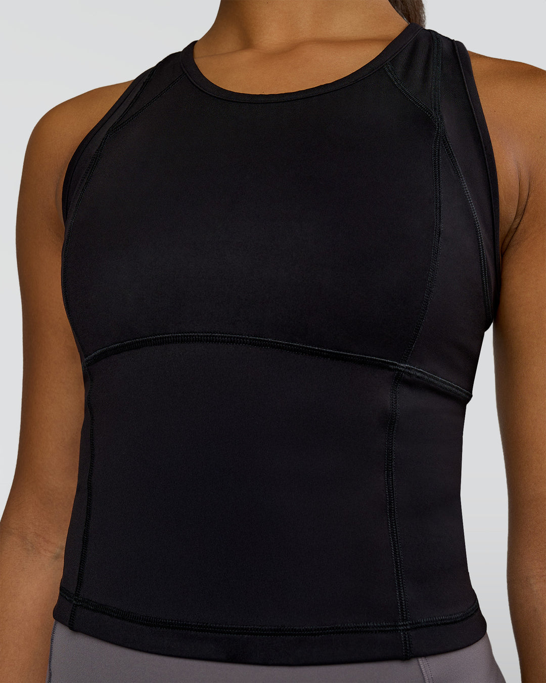 Woman wearing Bend Performance Tank - Black | Model:Rosie | Size:S - view 6