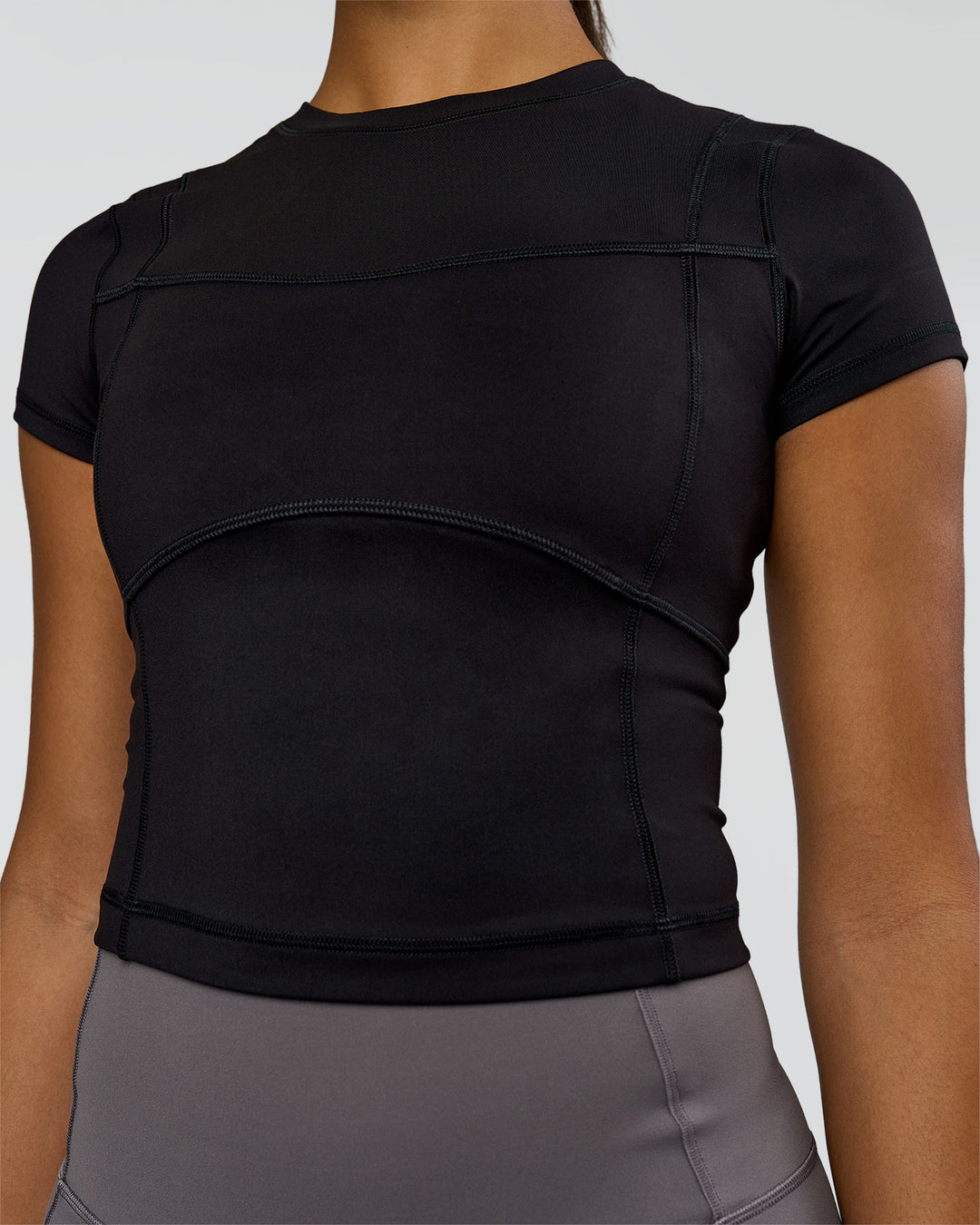 Woman wearing Bend Performance Tee - Black | Model:Rosie | Size:S - view 6