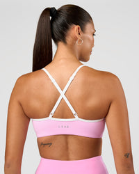 Woman wearing Blushing Sports Bra - Pink Rose-White | Model:Rhiley | Size:S | Thumbnail Index: 1