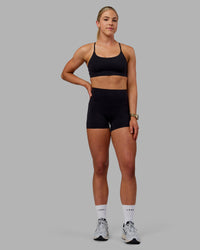 Woman wearing Bonded Sports Bra - Black | Thumbnail Index: 5