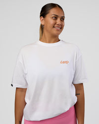 Woman wearing Break Through FLXCotton Oversized Tee - White-Pale Lilac | Model:Renee | Size:S | Thumbnail Index: 4