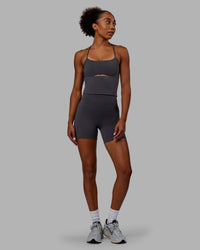 Woman wearing Bree Masters Fusion Ultra High-Rise 6" Short Pockets - Stormy | Thumbnail Index: 8