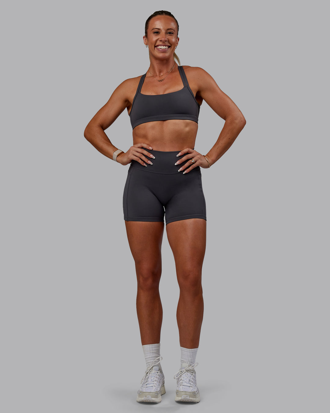 Woman wearing Bree Masters Velocity Sports Bra - Stormy - view 11