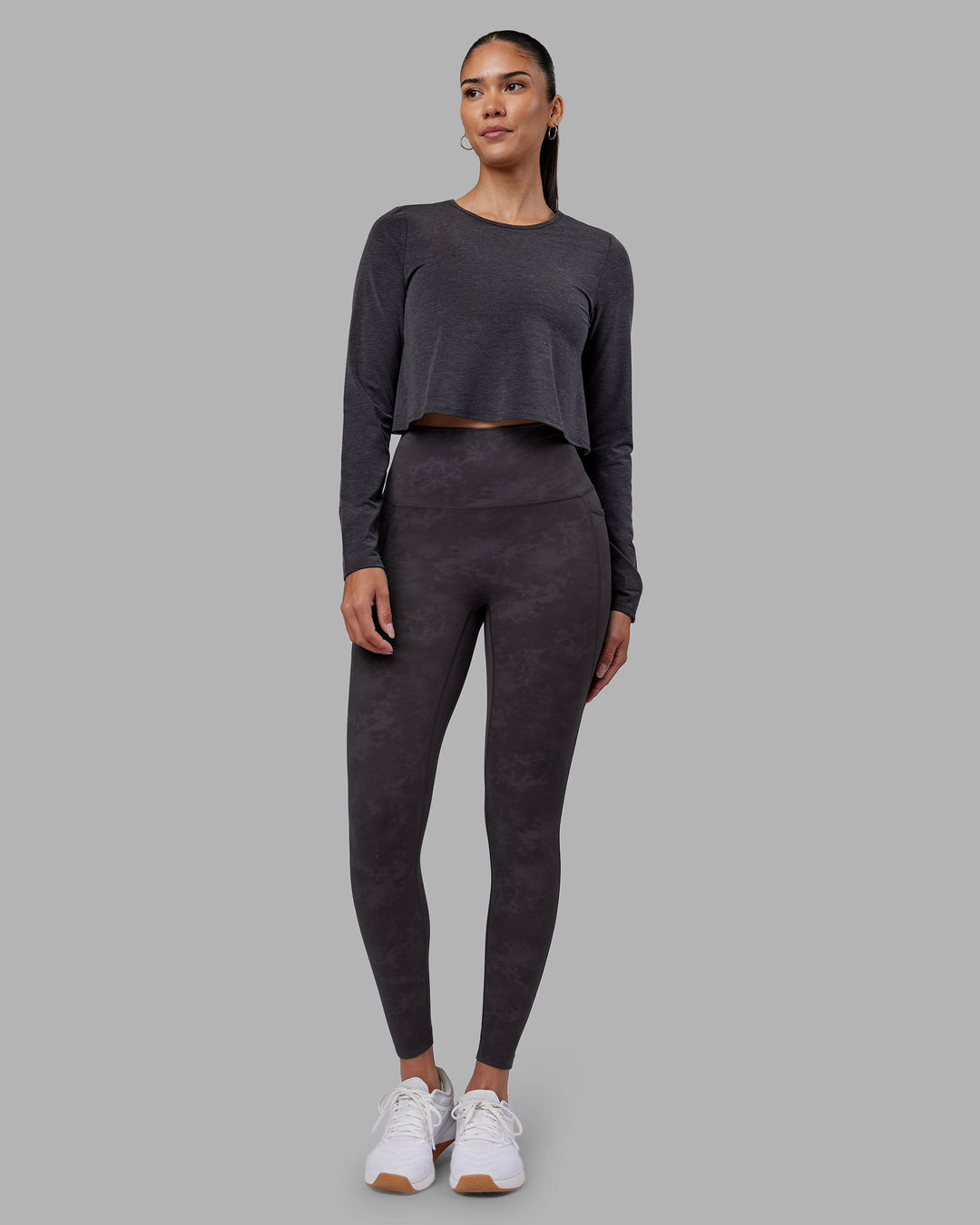 Woman wearing Breeze Long Sleeve Training Tee - Black | Model:Rhiley | Size:S - view 3