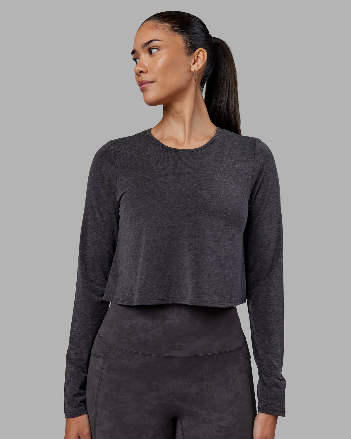 Woman wearing Breeze Long Sleeve Training Tee - Black | Model:Rhiley | Size:S