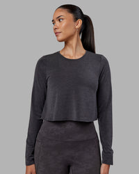 Woman wearing Breeze Long Sleeve Training Tee - Black | Model:Rhiley | Size:S | Thumbnail Index: 1