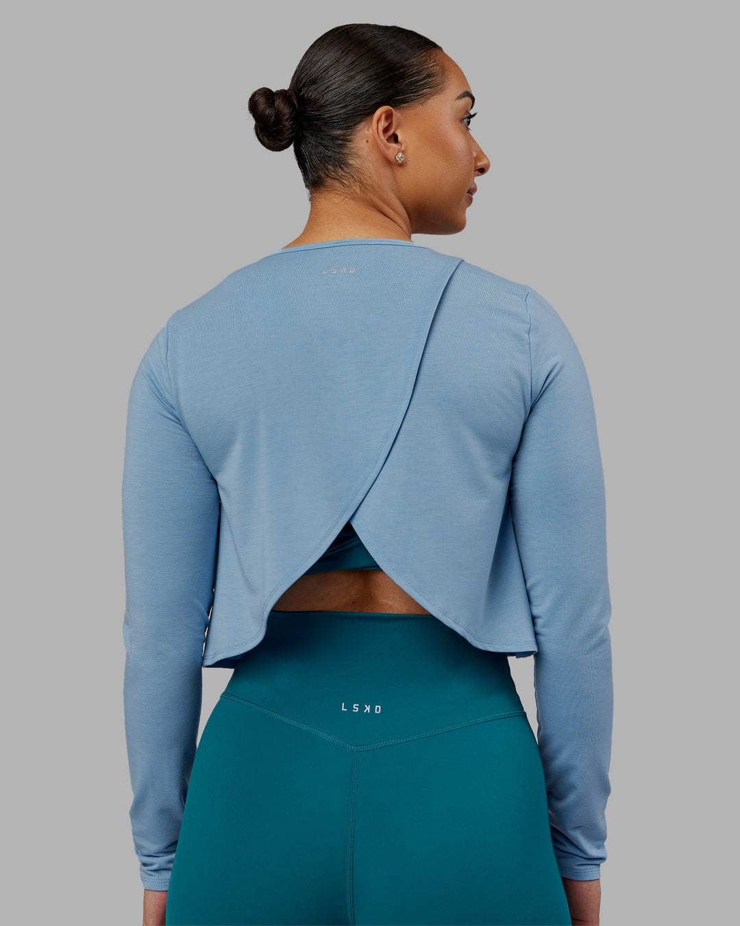 Woman wearing Breeze Long Sleeve Training Tee - Glacier Lake | Model:Ayla | Size:S - view 1