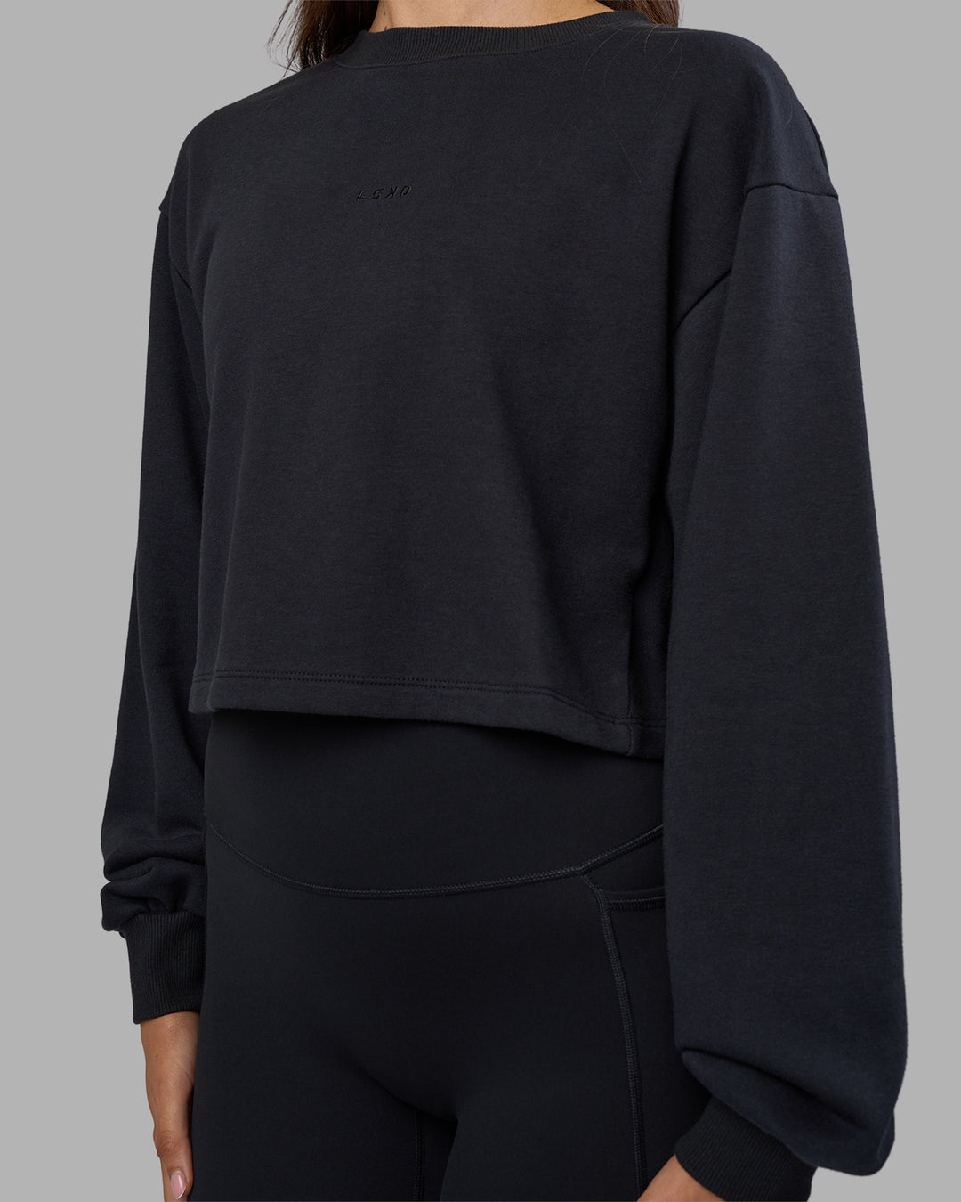Woman wearing Breeze Open Back Sweater - Black-Black | Model:Phoebe | Size:S - view 3