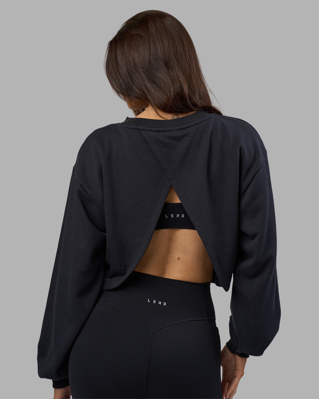 Woman wearing Breeze Open Back Sweater - Black-Black | Model:Phoebe | Size:S - view 4