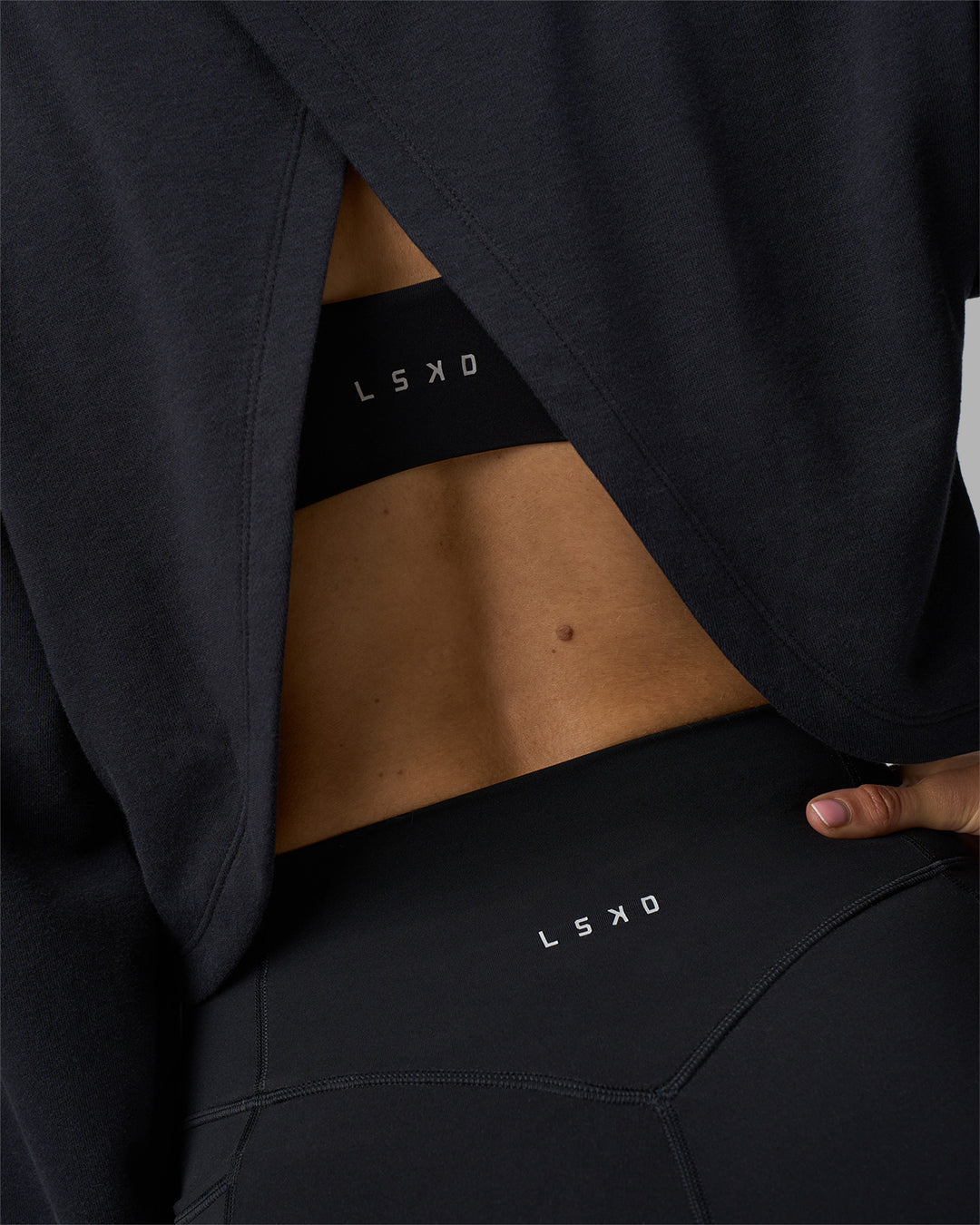 Woman wearing Breeze Open Back Sweater - Black-Black | Model:Phoebe | Size:S - view 5