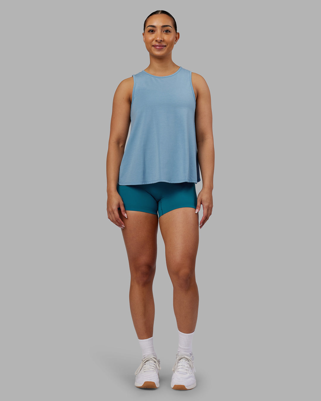 Woman wearing Breeze Training Tank - Glacier Lake | Model:Ayla | Size:S - view 5