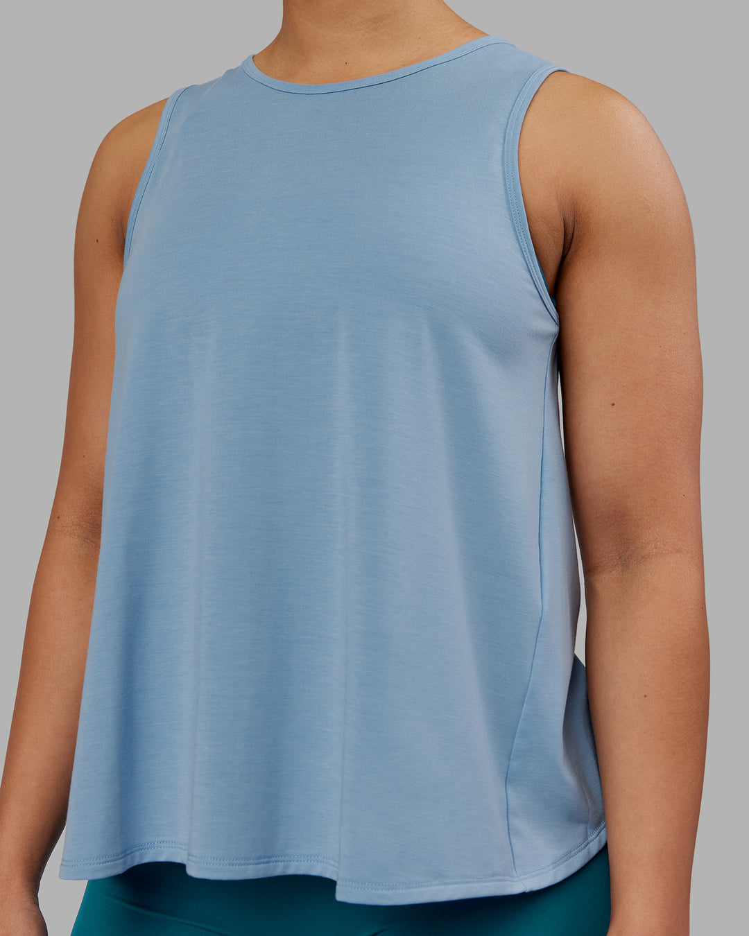 Woman wearing Breeze Training Tank - Glacier Lake | Model:Ayla | Size:S - view 4