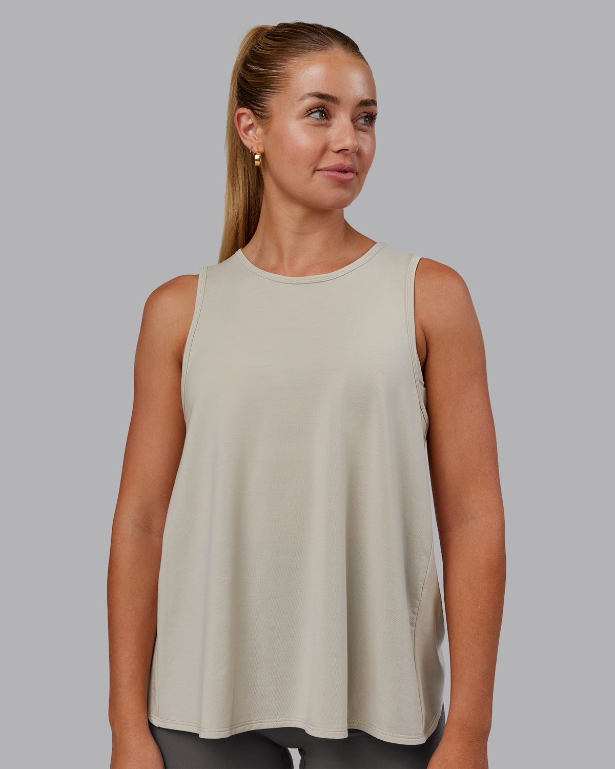 Woman wearing Breeze Training Tank - Shale Beige | Model:Hannah | Size:S