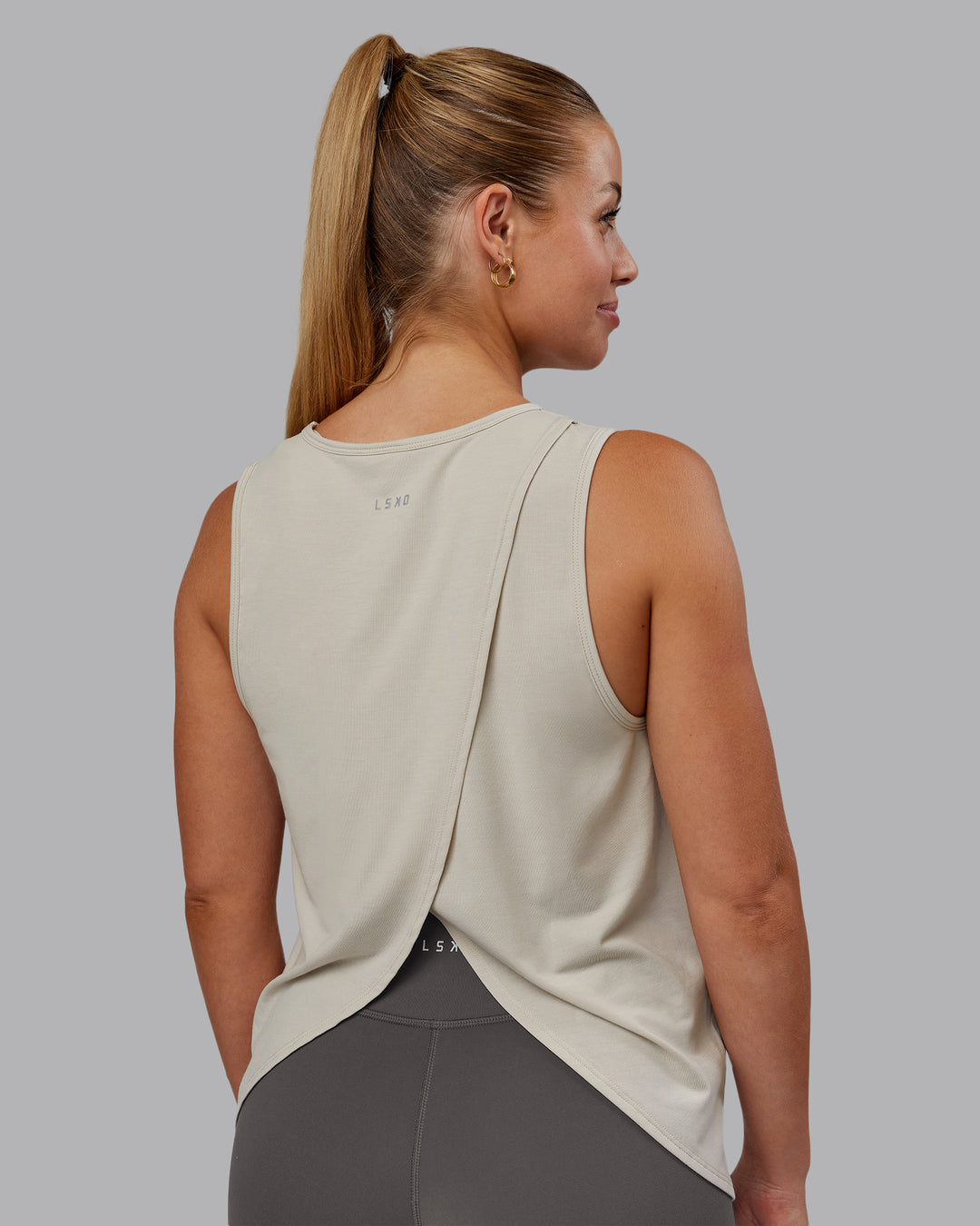 Woman wearing Breeze Training Tank - Shale Beige | Model:Hannah | Size:S - view 2