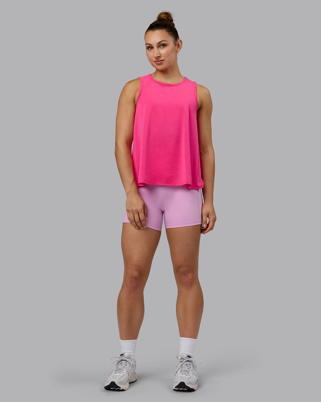 Woman wearing Breeze Training Tank - Ultra Pink - view 5