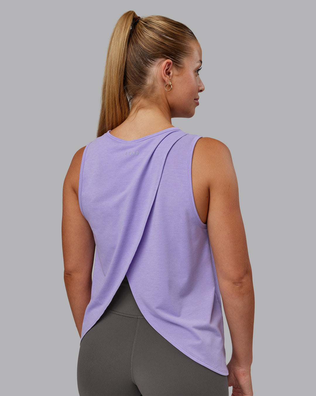 Woman wearing Breeze Training Tank - Violet Ray | Model:Hannah | Size:S - view 1