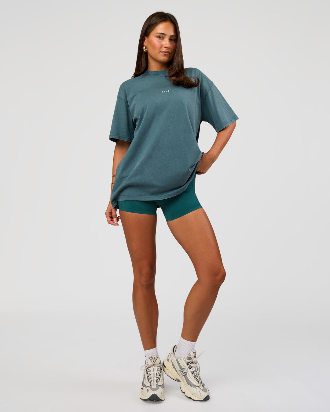 Woman wearing Built On Values Oversized Washed Tee - Transformative Teal Washed-White | Model:Bianca | Size:S - view 3